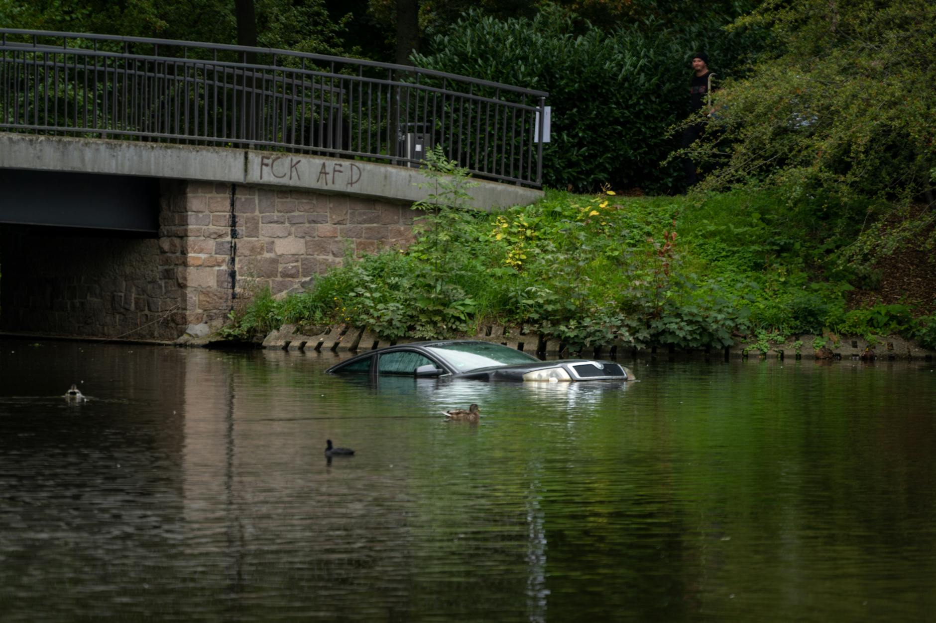 car submerged in the river