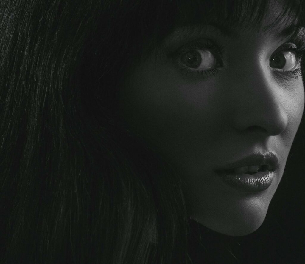 grayscale photography of woman s face